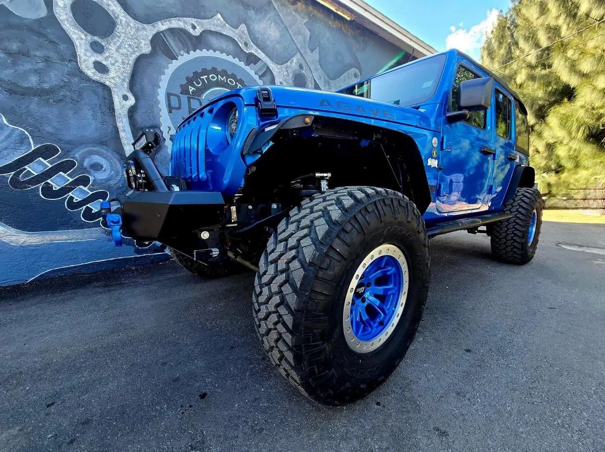 Blue Jeep with matching blue wheels