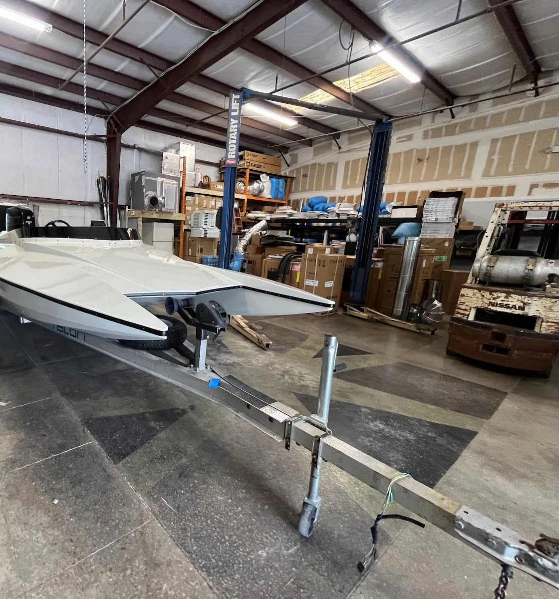 The shop floor with boats on trailers