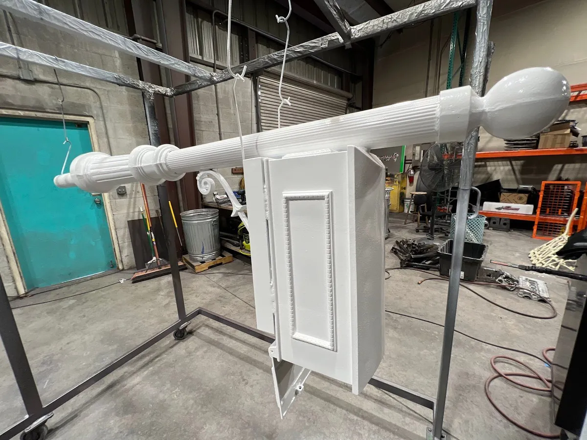 White parts hanging in the shop